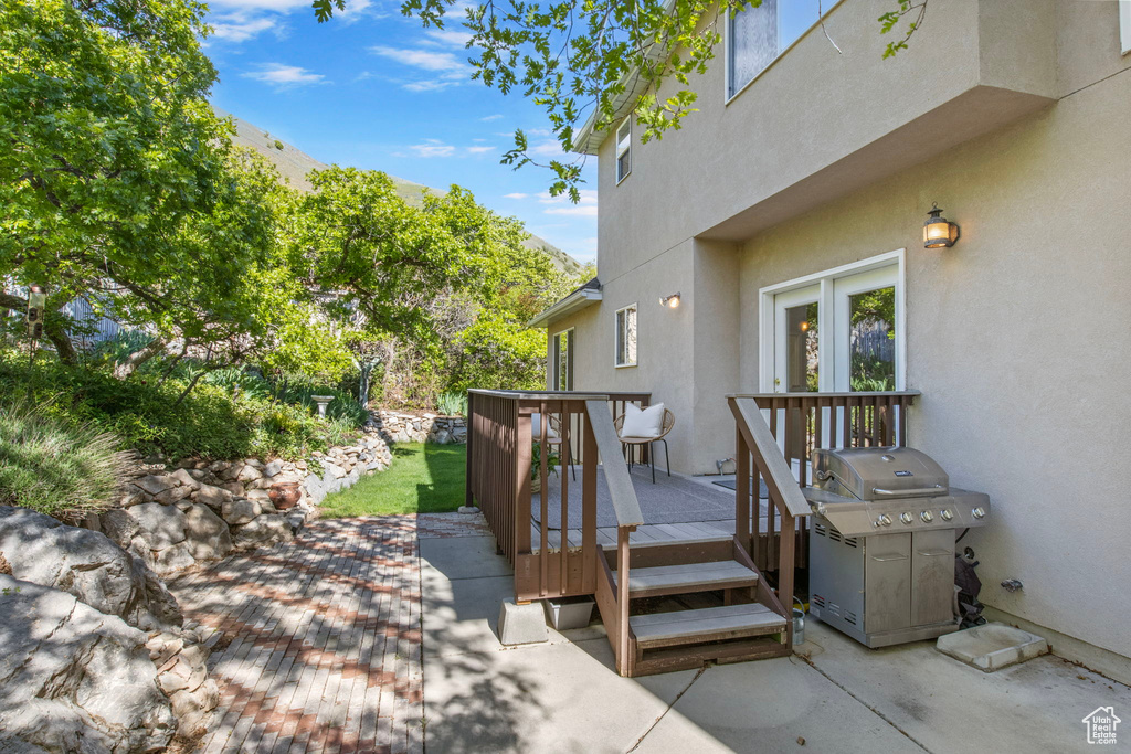 Wooden deck with a grill