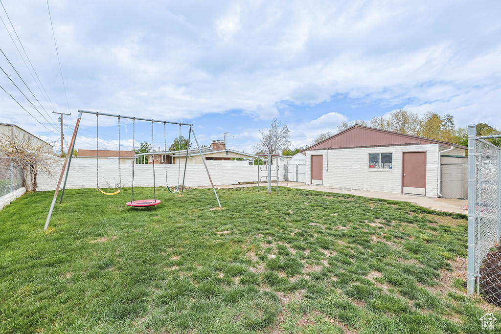 View of yard featuring a patio and a fenced backyard