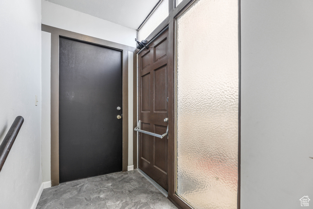 Entryway featuring baseboards