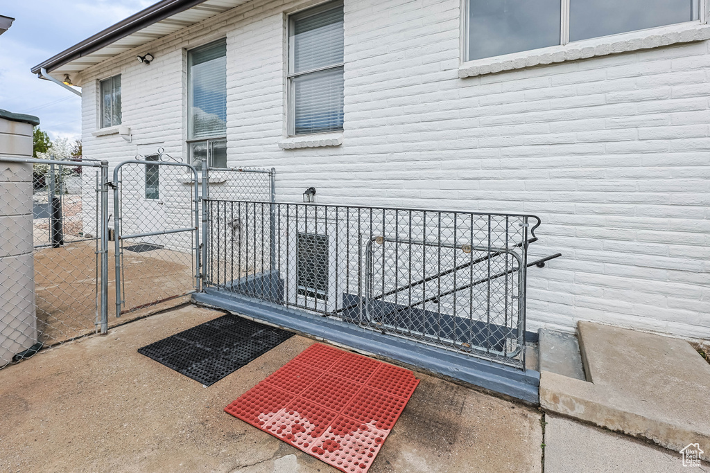 Exterior space with fence and a gate