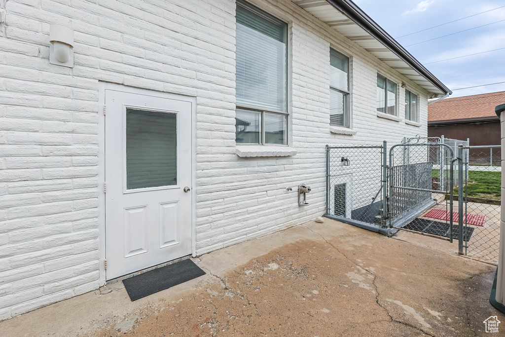 Exterior space with a gate and fence