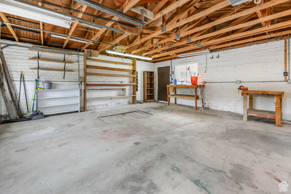 Garage featuring a workshop area