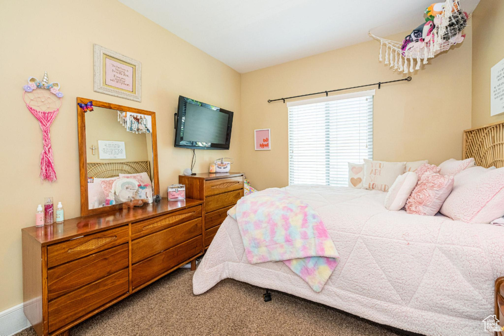 Bedroom featuring carpet flooring