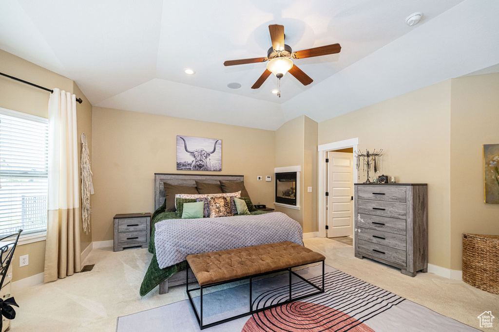 Bedroom featuring light colored carpet, a ceiling fan, baseboards, and recessed lighting