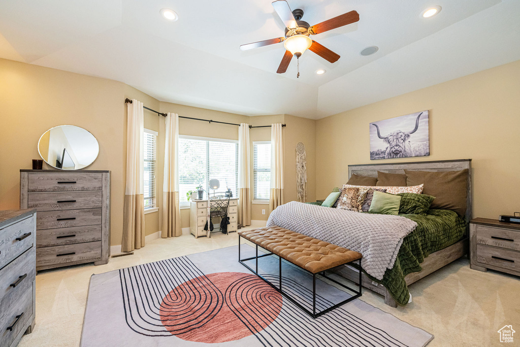 Bedroom with light colored carpet, recessed lighting, a ceiling fan, and baseboards