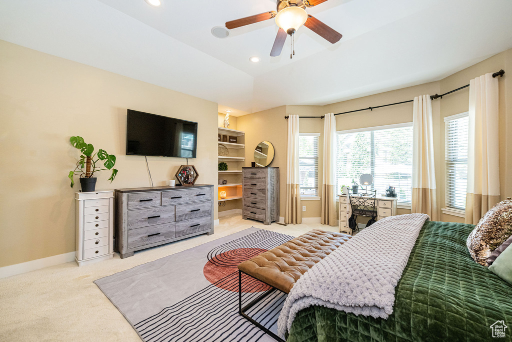 Bedroom with baseboards, light carpet, an office area, recessed lighting, and a ceiling fan