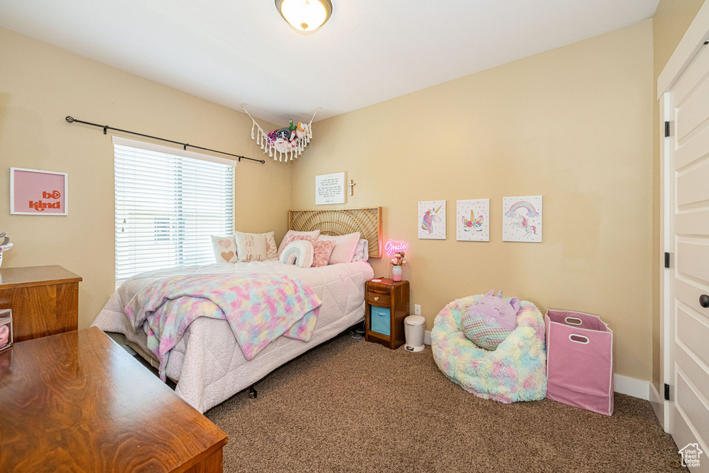 Bedroom with carpet