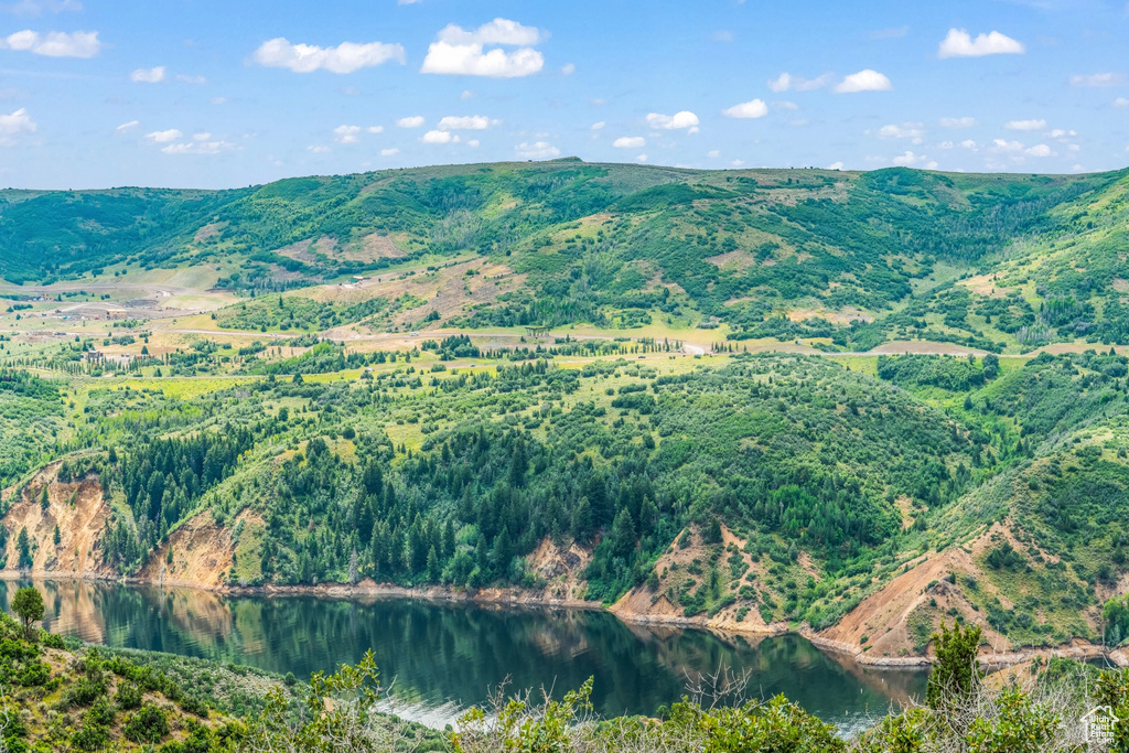 Mountain view featuring a large body of water