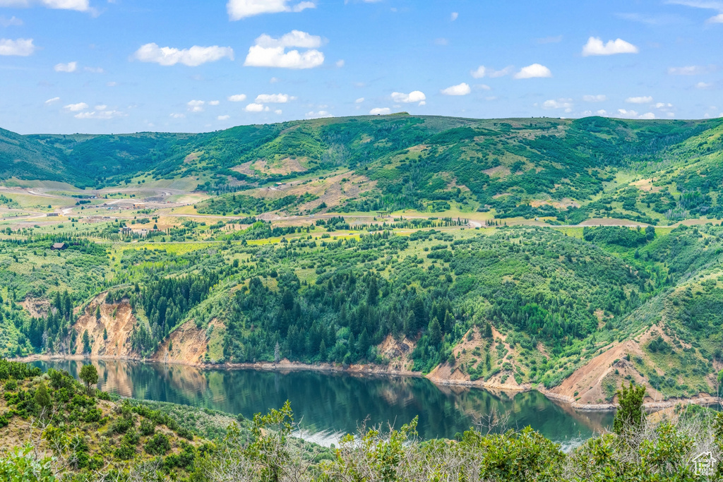 View of mountain background with a nearby body of water