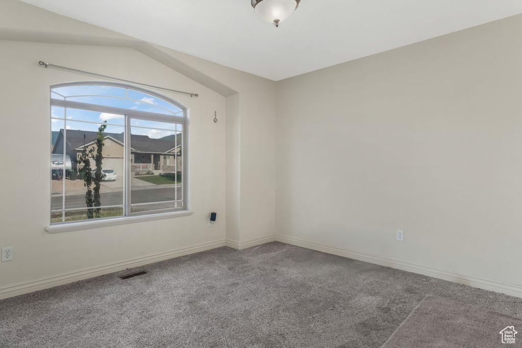 Spare room with carpet flooring and baseboards