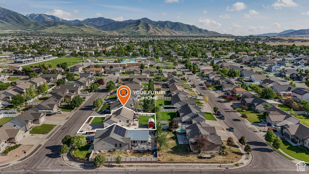 Aerial perspective of suburban area featuring mountains