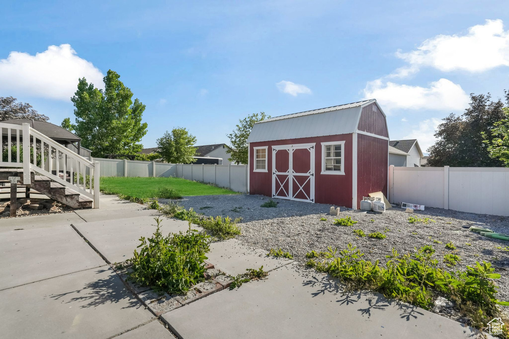 View of fenced backyard