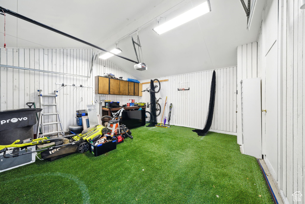 Garage featuring a garage door opener