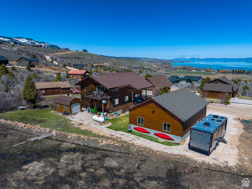 Aerial view of residential area with a mountain backdrop