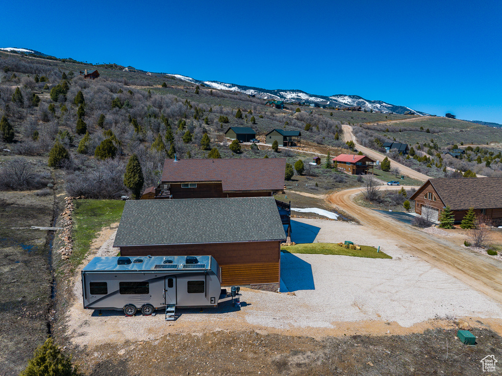View of subject property with a mountainous background
