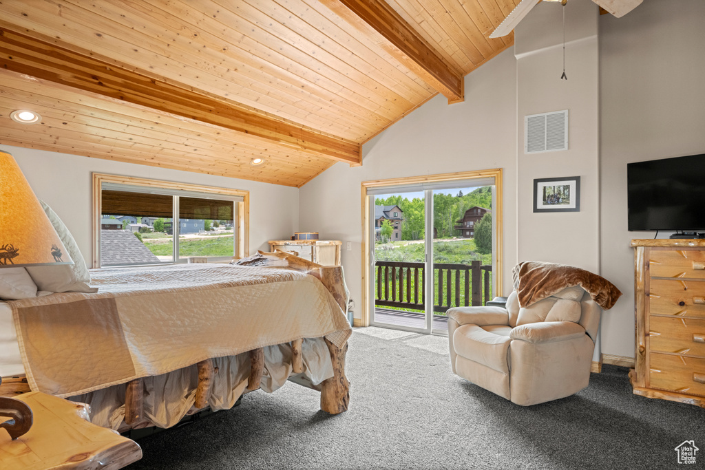 Carpeted bedroom featuring access to outside, multiple windows, wooden ceiling, and recessed lighting