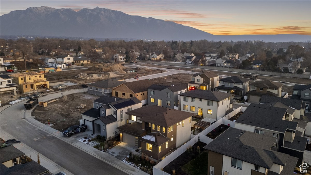 Aerial view at dusk of a mountain view and a residential view
