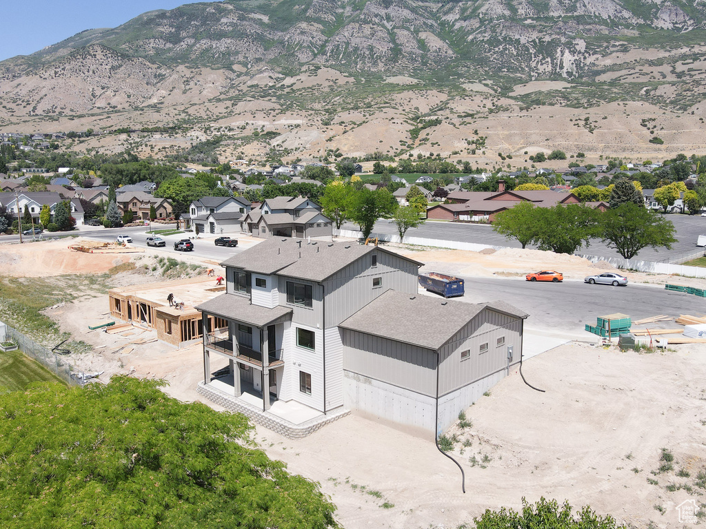 Aerial view of residential area with a mountainous background