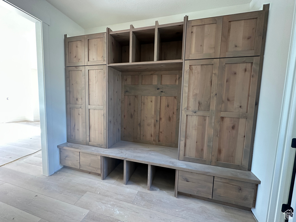 Mudroom featuring light wood finished floors