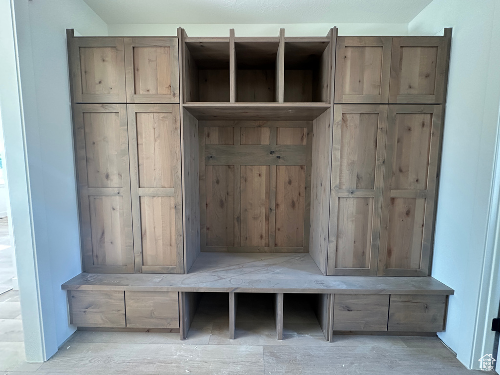 Mudroom with wood finished floors