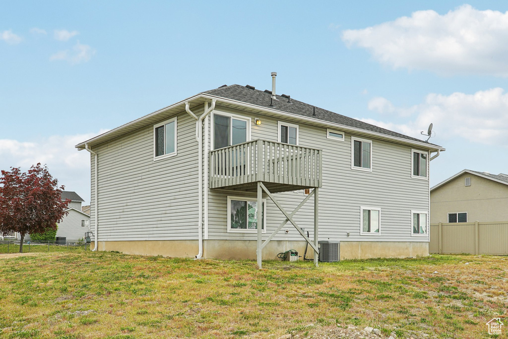 Back of property with cooling unit