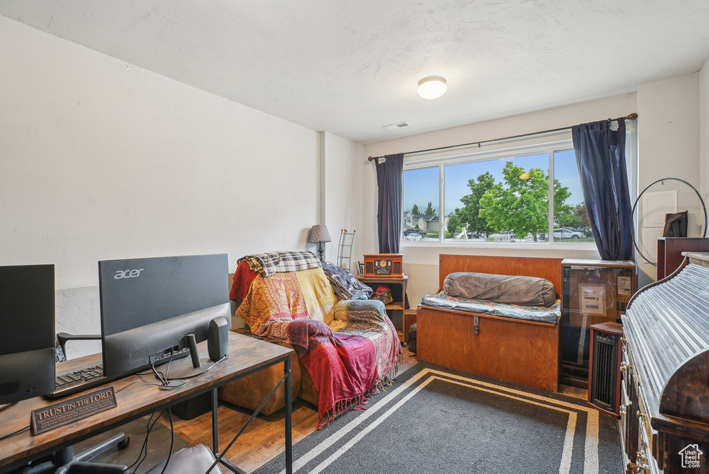 Bedroom featuring an office area