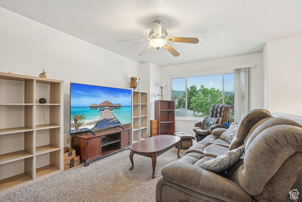 Living area with a ceiling fan