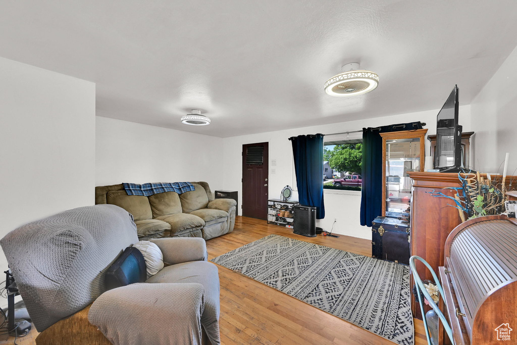 Living room featuring wood finished floors