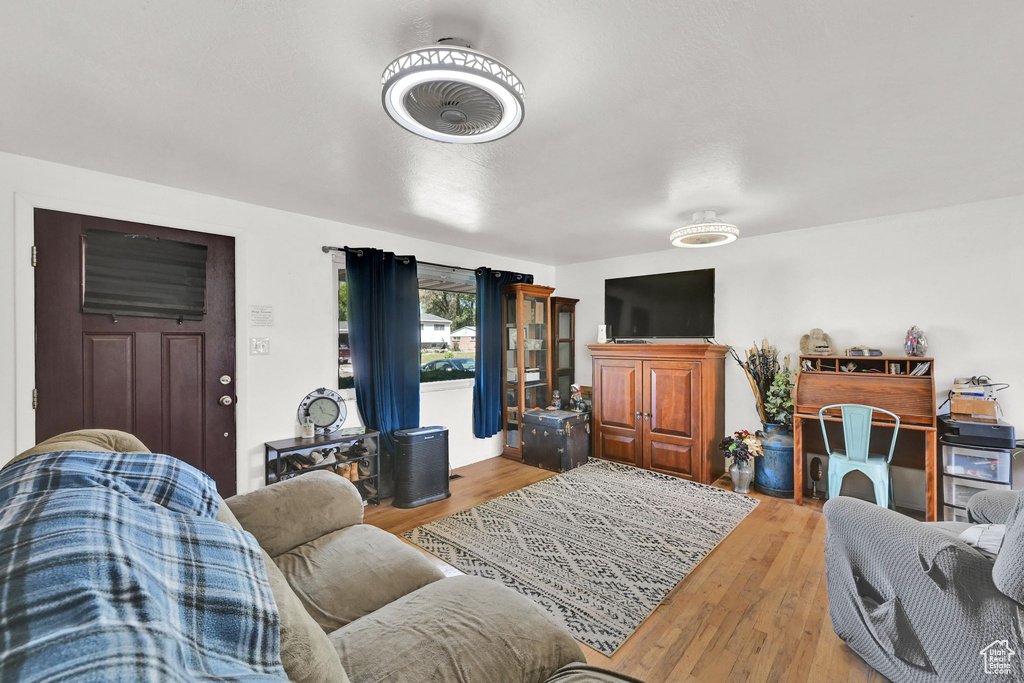 Living area featuring light wood-style flooring