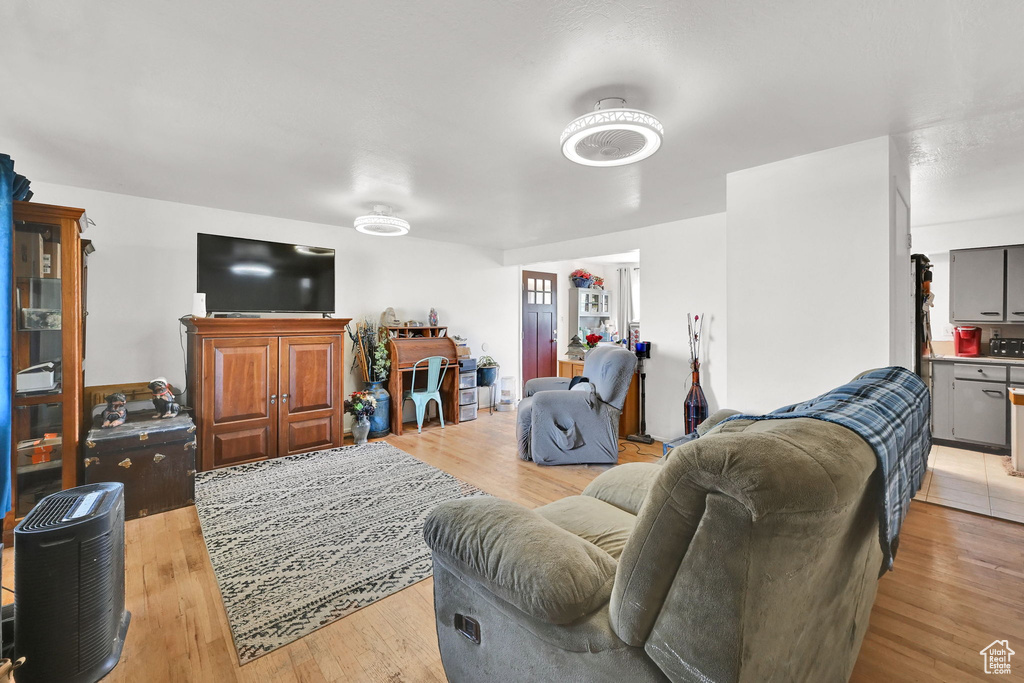 Living room featuring light wood-style flooring