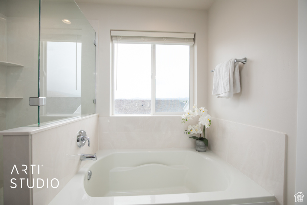 Full bath with a garden tub