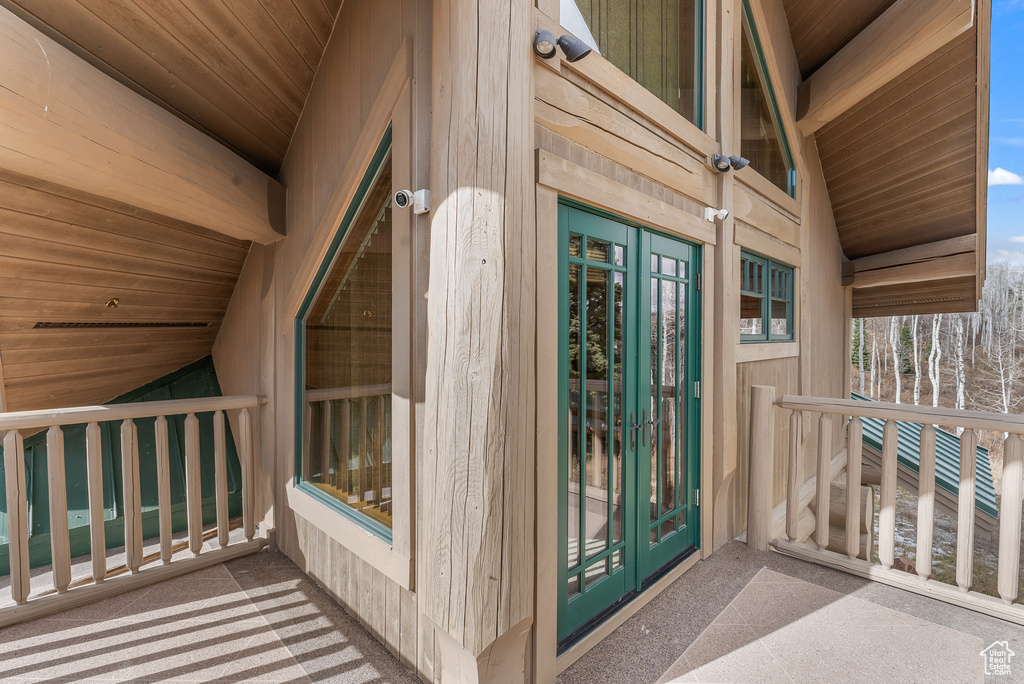 Property entrance featuring french doors