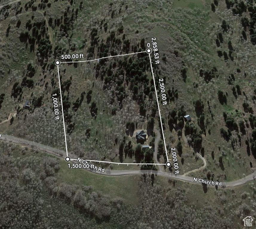 Aerial map of property and surrounding area with property parcel outlined