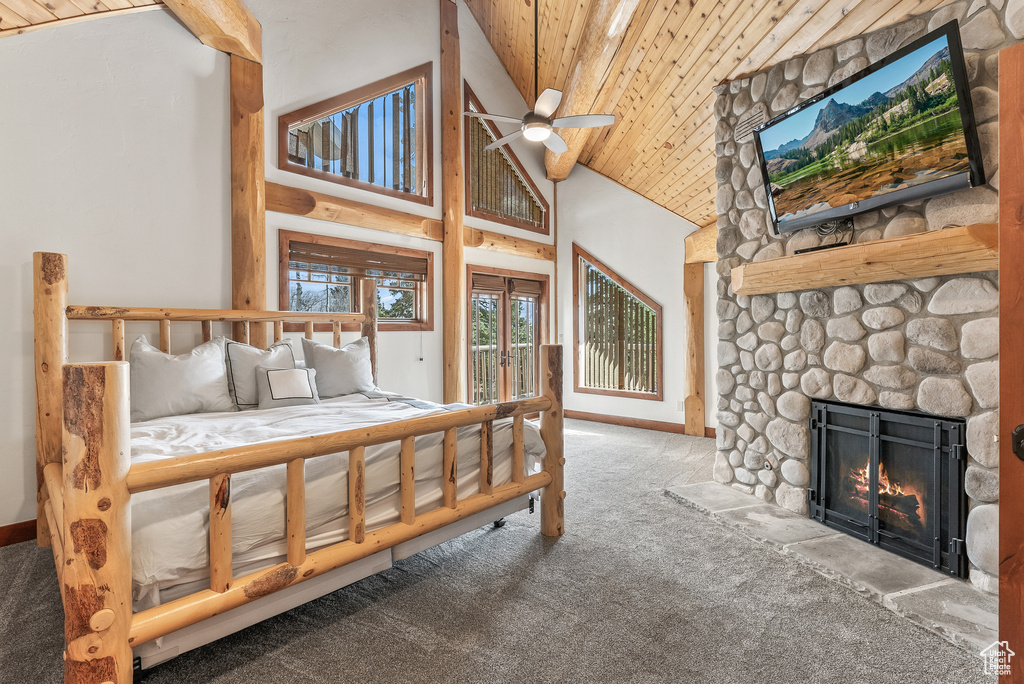 Bedroom featuring carpet, high vaulted ceiling, a fireplace, wooden ceiling, and access to outside