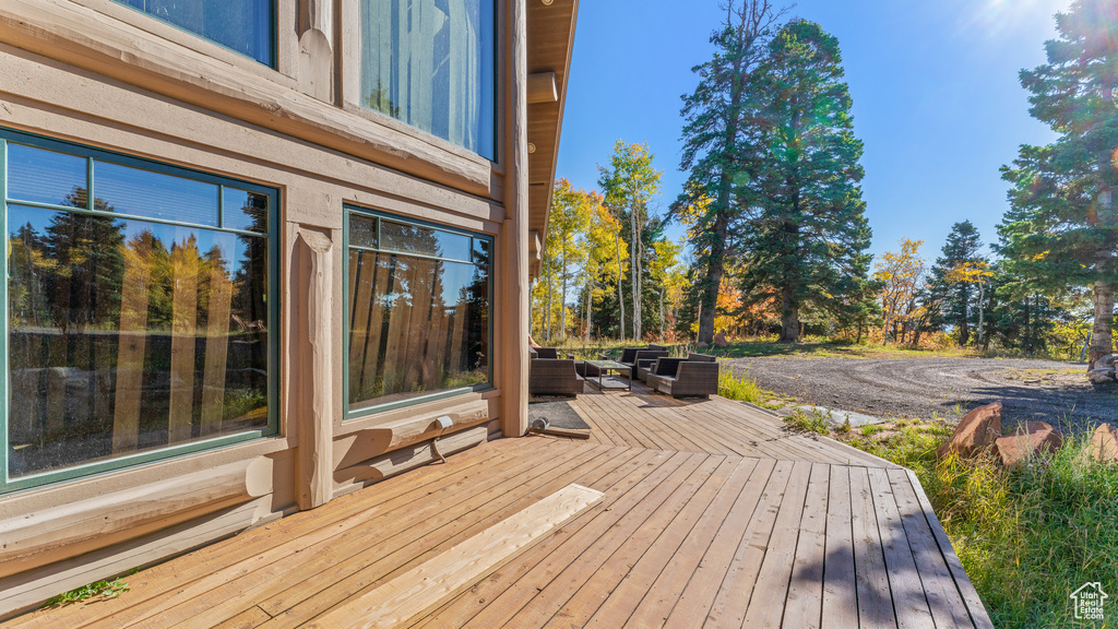 Wooden deck with outdoor lounge area
