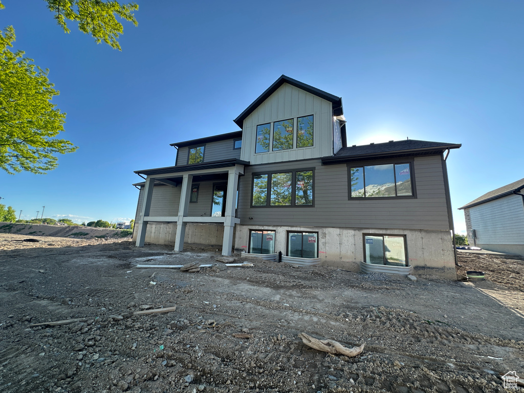 Back of house featuring board and batten siding