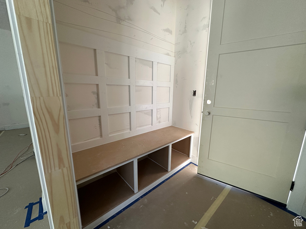 Mudroom with concrete flooring