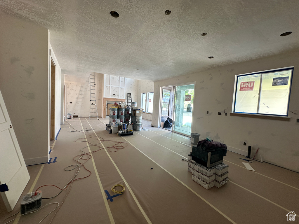 Living room featuring a textured ceiling