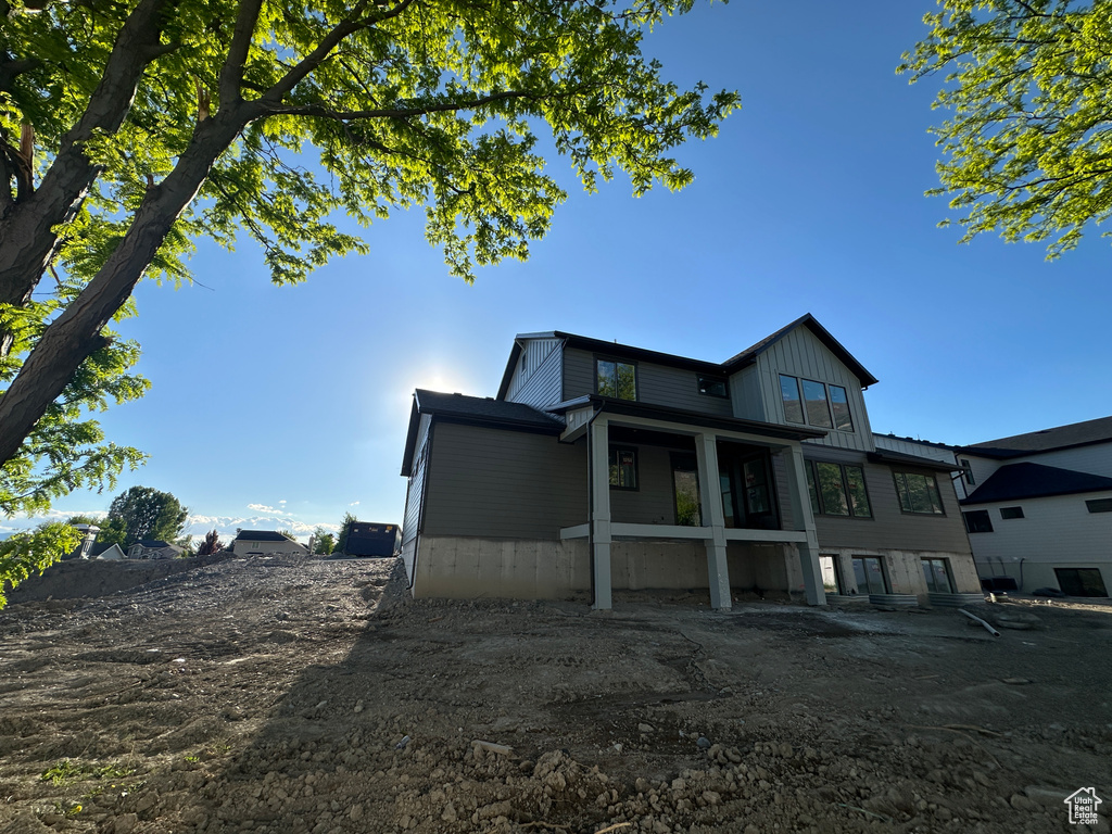 Back of house featuring board and batten siding