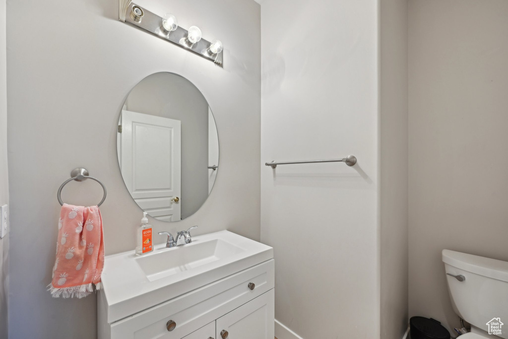 Bathroom featuring toilet and vanity
