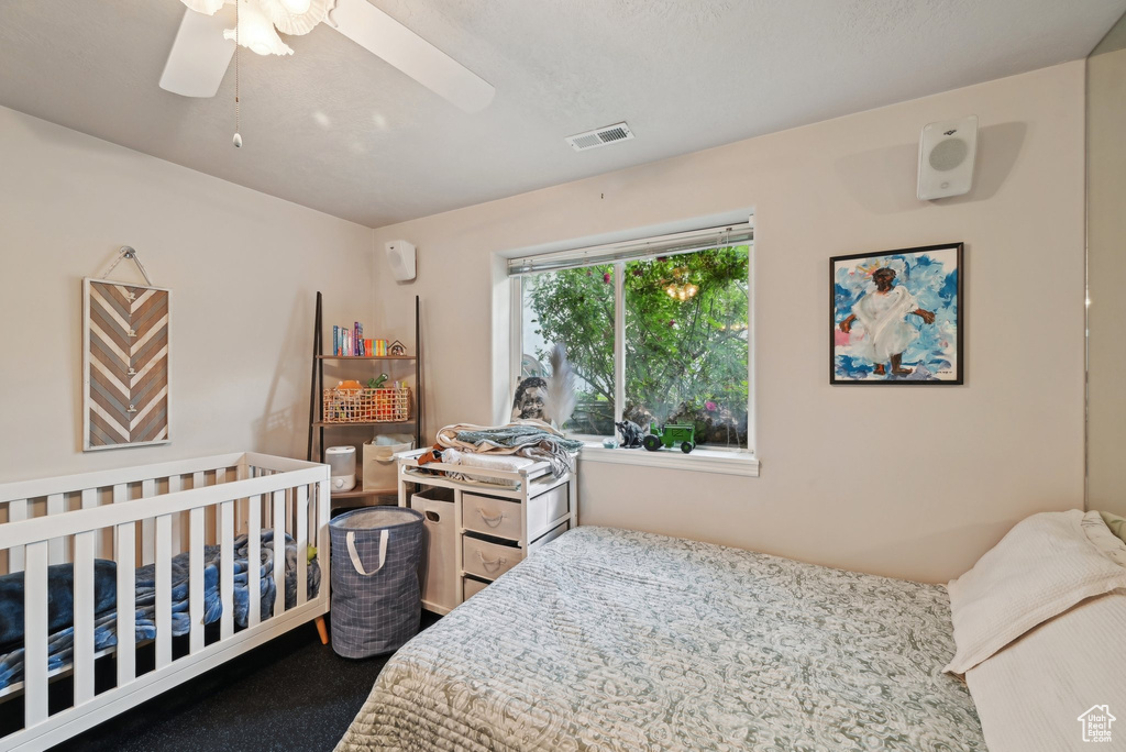 Bedroom with a ceiling fan