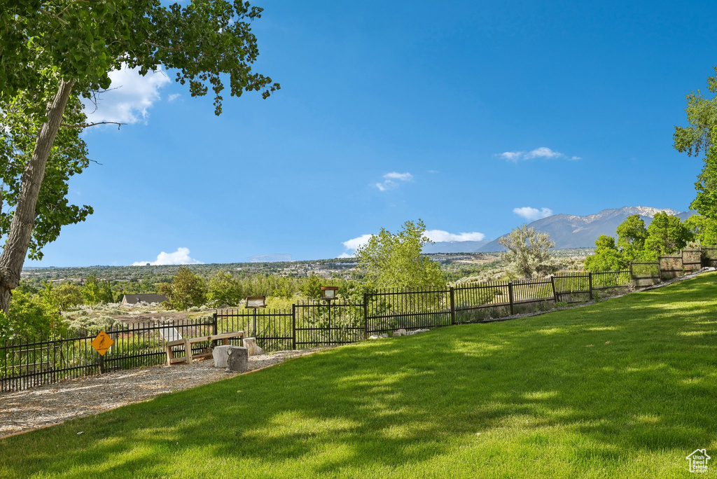 View of yard with a mountain view