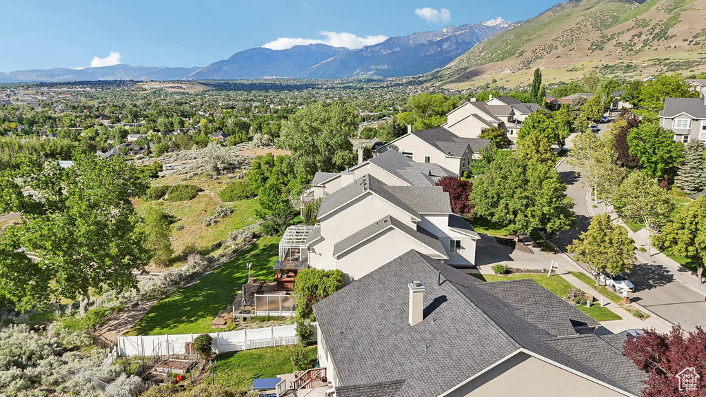 Aerial perspective of suburban area with mountains