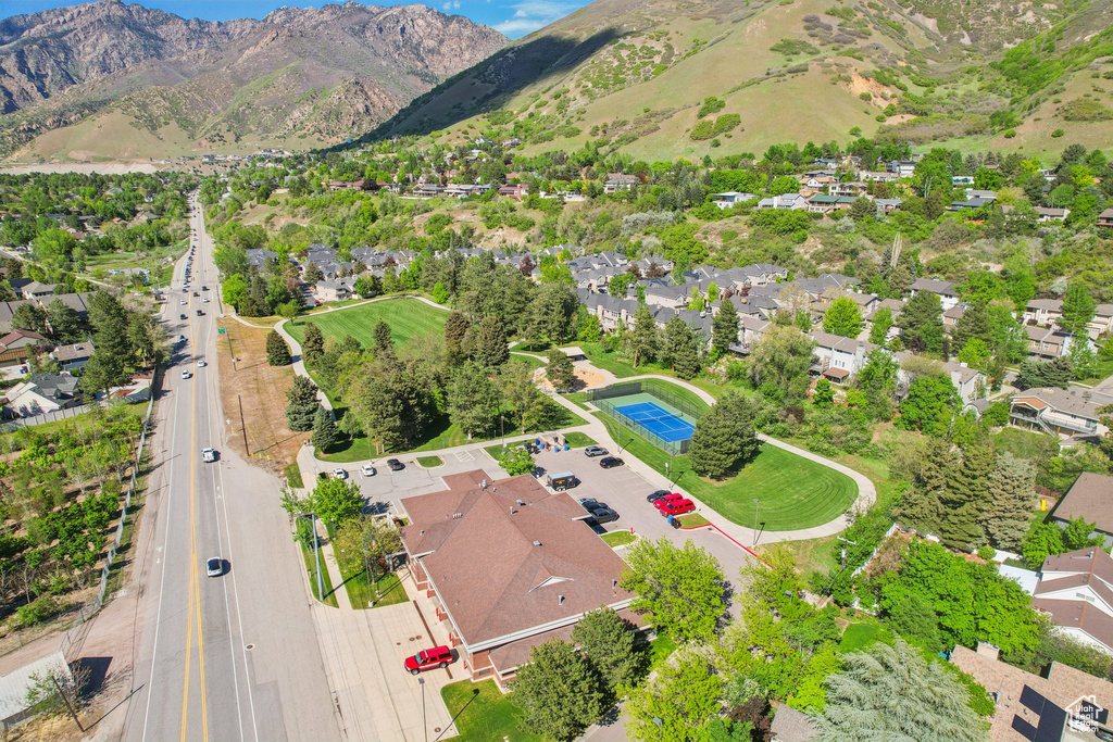 Aerial view of residential area with a mountain backdrop