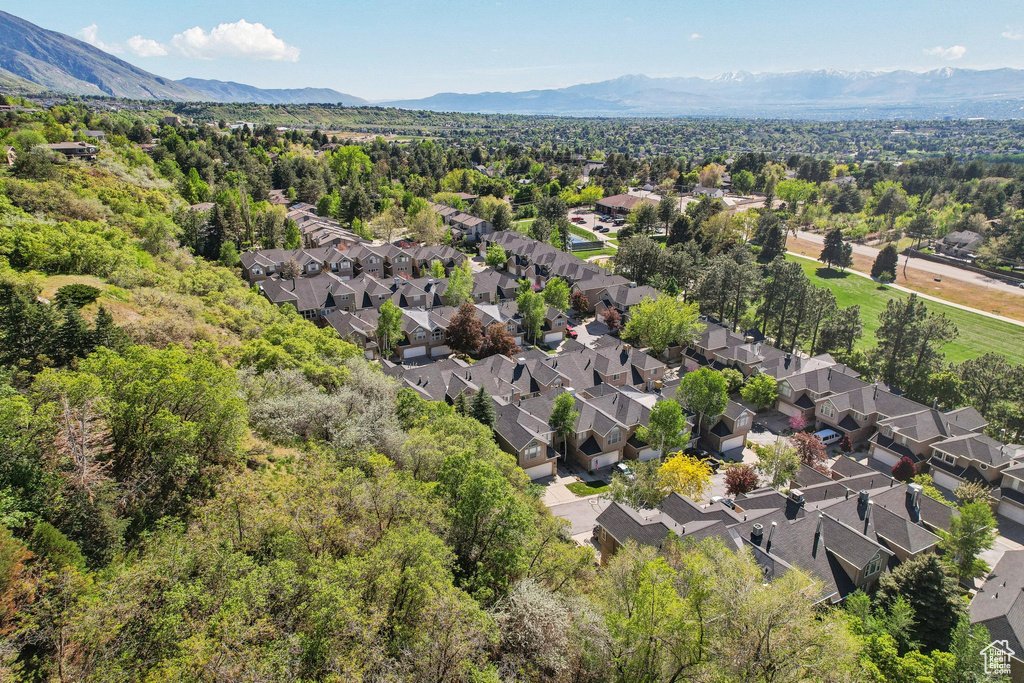 Aerial view of residential area with mountains