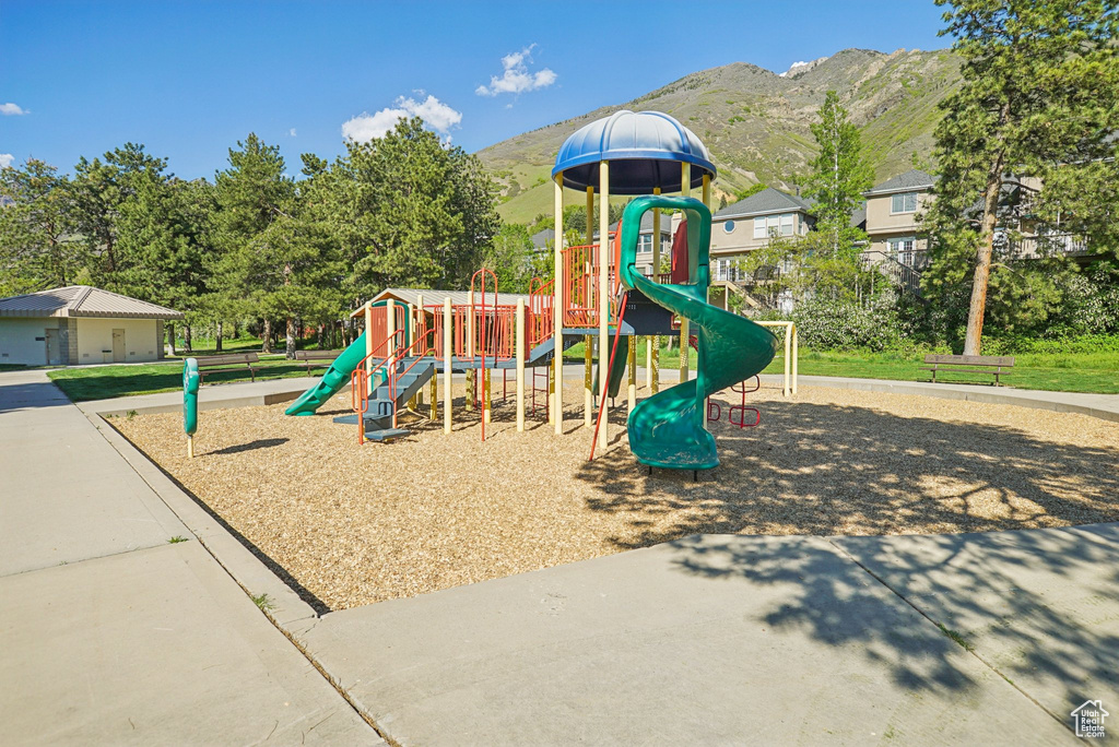 Community jungle gym featuring a mountain view