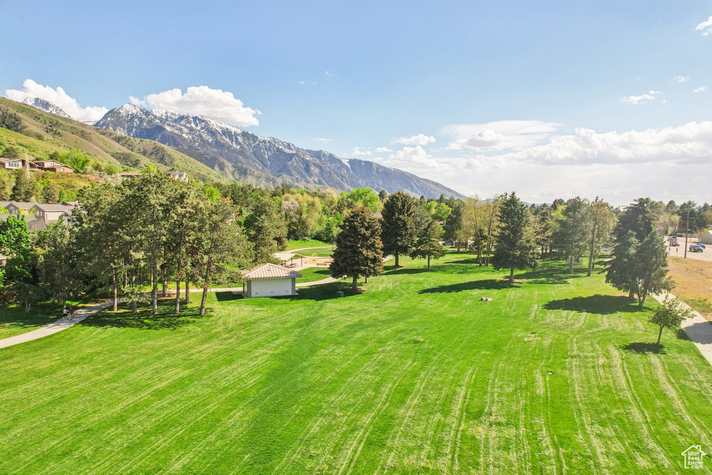 View of mountain backdrop featuring rural landscape