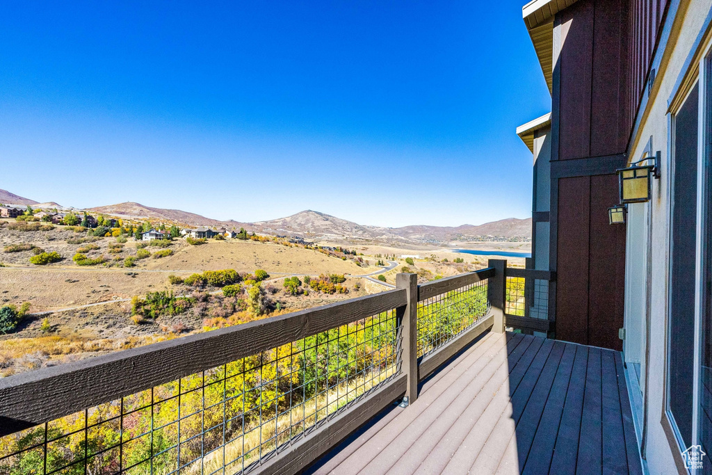 Wooden deck featuring a mountain view