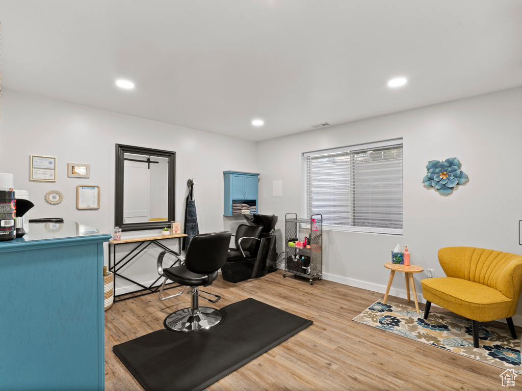 Office featuring light wood finished floors, baseboards, and recessed lighting