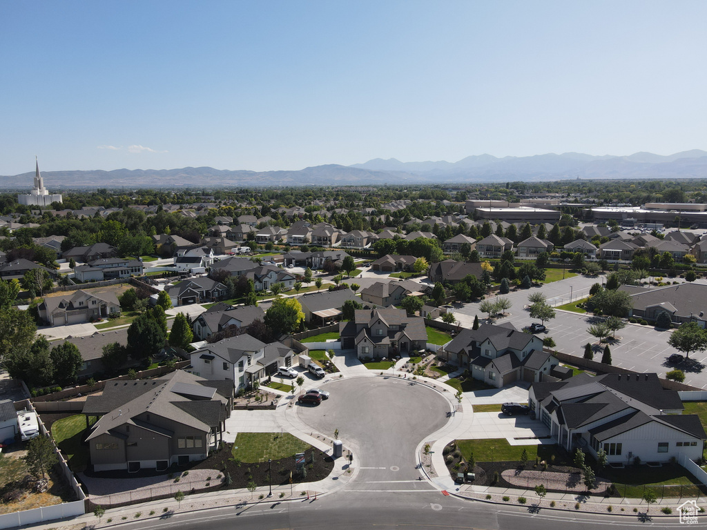 View of property location featuring nearby suburban area and a mountainous background